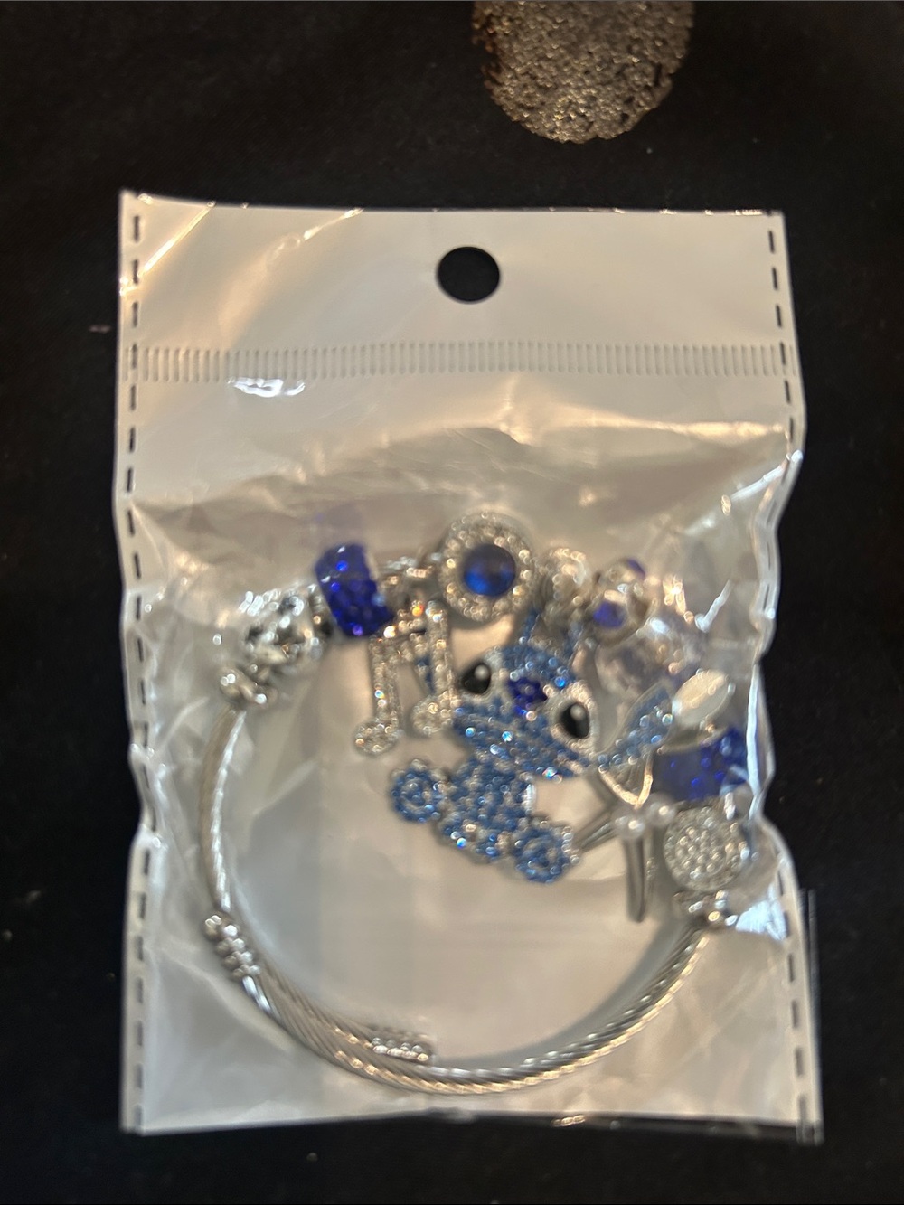 Silver-tone Charm Bracelet with Blue Accents